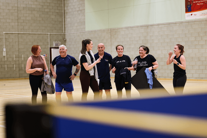 Group of active people completing a sports session