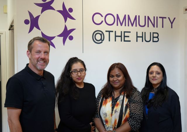 Councillor gary allen left and zeba alam right with course participants sabira iqbal and hena hasna