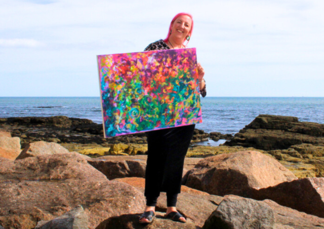 Emily Carter with one of her artworks, 'Medusa'