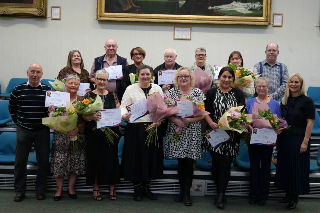 The foster carers with (left) Councillor Moss Boddy and (right) Alison Sutherland, the Council’s Executive Director of Children’s Services