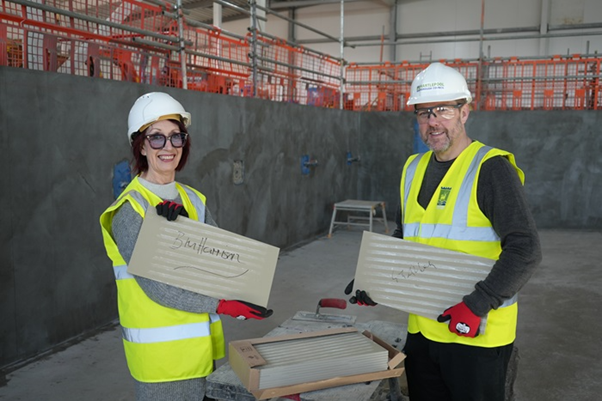 Councillor Brenda Harrison and Councillor Gary Allen with their signed tiles.