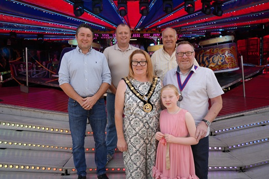 (Back, l-r): Fair co-organiser John Murphy, Headland Parish Council Chair Councillor Scott Gaiety, fair co-organiser Billy Freeman. (Front, l-r): Ceremonial Mayor of Hartlepool Councillor Sue Little with her granddaughter and Mayor's Consort Paul Little