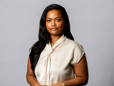 Headshot Quewone Bailey-Fleet councillor in off white silk shirt