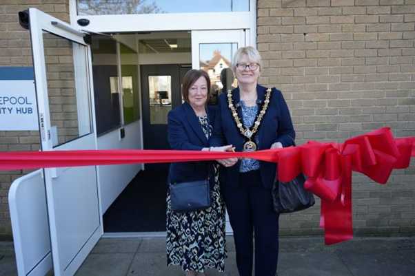 Christine Hodgson (left) and Councillor Carole Thompson cut the ribbon to officially open the Seaton Carew Community Hub
