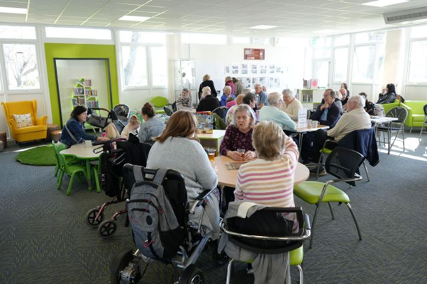 People enjoying the communal space in seaton hub