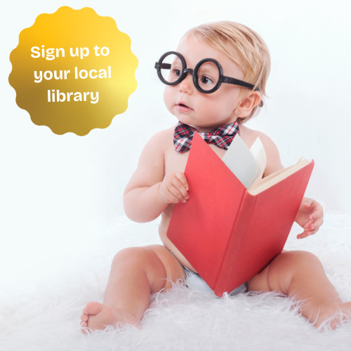 Baby sat on rug reading a book wearing glasses and a bow tie.