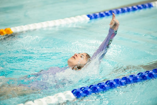 Tayler demonstrates her swimming skills