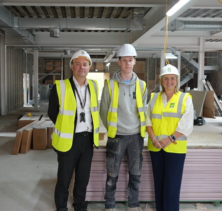 Apprentice joiner Owen Pounder (centre) with Hartlepool Town Deal Board Chair Darren Hankey and Councillor Pamela Hargreaves, Chair of Hartlepool Borough Council's Economic Growth and Regeneration Committee