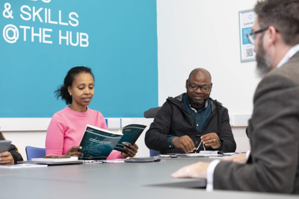 Classroom with student looking at text book